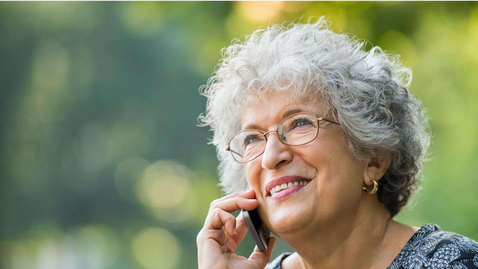 50+ woman on phone